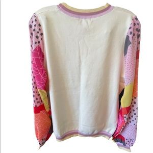 FATE PRINTED SLEEVE SWEATER. SIZE L.  NWT